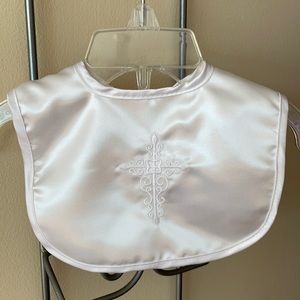 NWT Christening bib with cross embellishment.